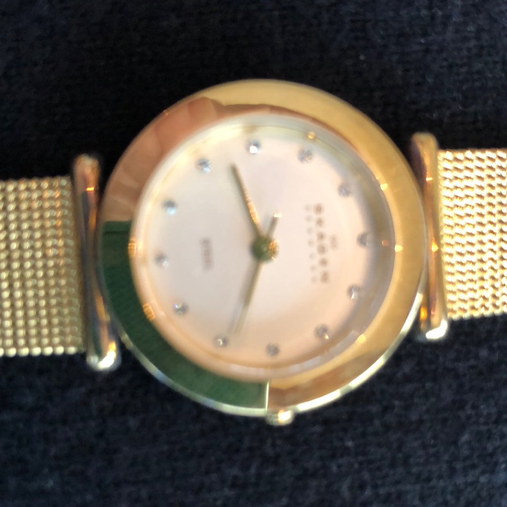 Skagen gold color watch with clear stones